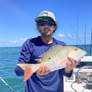 Capt. Dominique Mirisola with a snapper